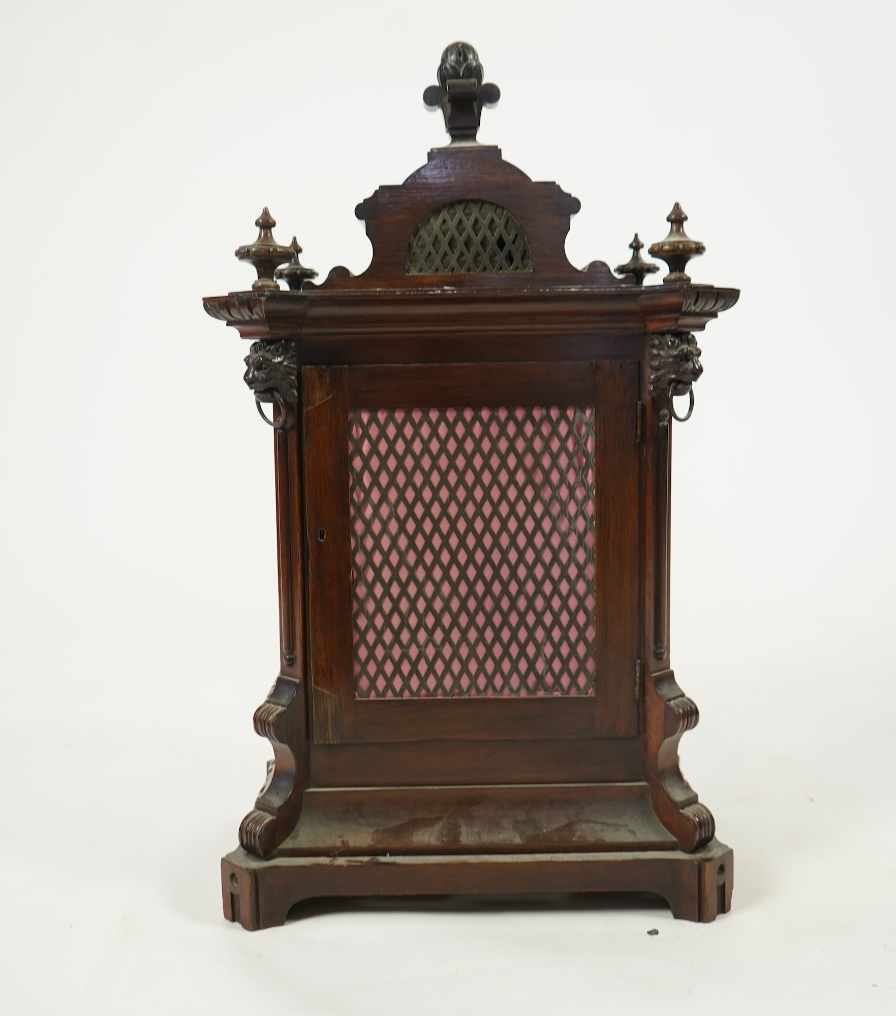 A late 19th century carved oak triple fusee bracket clock